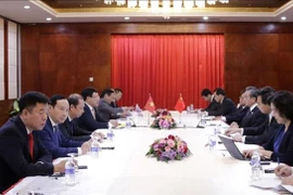 Pham Binh Minh rencontre ses homologues chinois et lao 