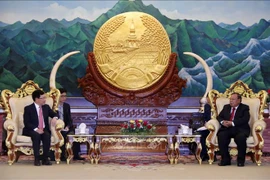 Le vice-PM Pham Binh Minh rencontre les dirigeants du Laos