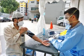 Singapour signale deux citoyens vietnamiens contaminés au COVID-19