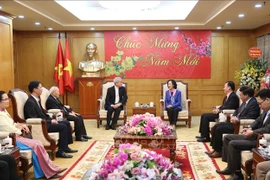 Une membre du Politburo salue les contributions des catholiques