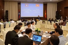 Colloque Vietnam - Laos sur la coopération dans le travail et le bien-être social