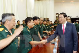 Le président Tran Dai Quang formule ses vœux du Tet à An Giang et à Can Tho