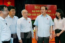 Le président Tran Dai Quang rencontre des électeurs de Ho Chi Minh-Ville
