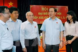 Le président Tran Dai Quang rencontre des électeurs de Ho Chi Minh-Ville