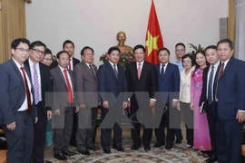 Le vice-PM Pham Binh Minh reçoit la délégation de l’Union de la jeunsse du Laos