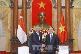 Le président Tran Dai Quang reçoit le Premier ministre Lee Hsien Loong