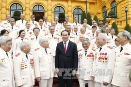 Tran Dai Quang rencontre d’anciens policiers envoyés au Sud pendant la guerre