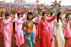 Honneur à la beauté des femmes vietnamiennes à Macao (Chine) 