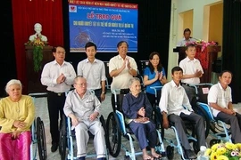 Œuvrer ensemble pour aider les handicapés