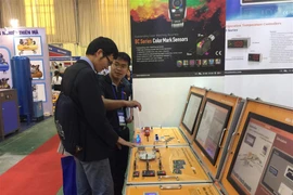 Ouverture des expositions de produits industriels et de bois à Hanoï et HCM-Ville