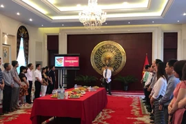 La Journée des invalides de guerre et des morts pour la Patrie célébrée en Chine et au Cambodge