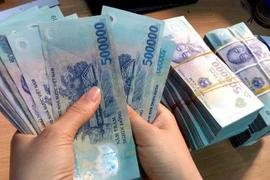 Le Vietnam réduit l'écart de salaire avec Singapour