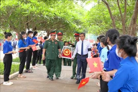 Gia Lai : Inhumation des restes de soldats volontaires et experts vietnamiens morts au Cambodge. Photo: VNA