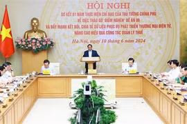 Le Premier ministre Pham Minh Chinh lors de la conférence. Photo:! VNA
