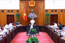Le Premier ministre Pham Minh Chinh s’exprime lors de la réunion, à Hanoi, le 22 juillet. Photo: VNA