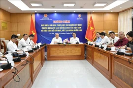 Les participants à la conférence, à Hanoi, le 27 juin. Photo : VNA