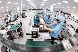 Les politiques favorisant l’investissement, conjuguées à des incitations fiscales et à l’émergence de zones industrielles autour de Hanoi et de Hô Chi Minh-Ville, positionnent le Vietnam comme une destination privilégiée pour les investisseurs étrangers à la recherche de possibilités de croissance durable sur le long terme. Photo : VNA