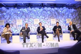 Forum économique mondial de Davos: le Vietnam souligne le développement du marché de services 