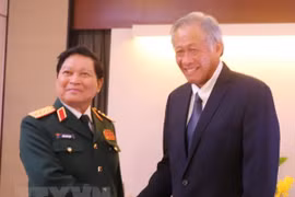 Shangri-La 2018 : le ministre Ngo Xuan Lich rencontre des représentants de différents pays