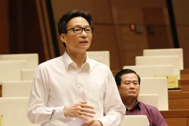 Education : le vice-PM Vu Duc Dam parle devant les députés