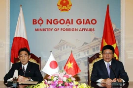Le vice-PM Pham Binh Minh et ministre japonais des Affaires étrangères Fumio Kishid. Source: VNA