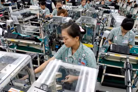 Fabrication de téléphones mobiles. Photo: Congthuong