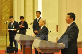 Le secrétaire général du Parti communiste du Vietnam (PCV) Nguyen Phu Trong et son homologue chinois Xi Jinping à la 15e édition des Rencontres d'amitié des jeunes Vietnam-Chine. 