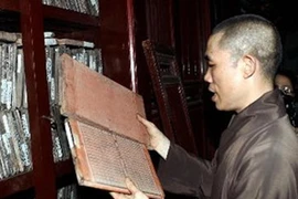 Les tablettes en bois de la pagode de Vinh Nghiêm, reconnues par l’UNESCO. Photo : internet