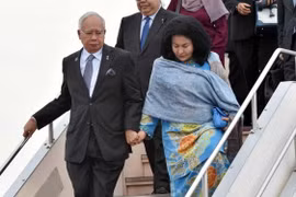 Le Premier ministre malaisien, Najib Razak et son épouse. Photo : AFP