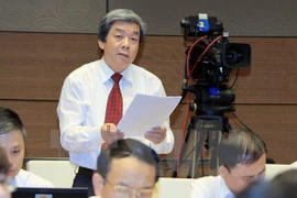 Débats de l'AN sur le développement socioéconomique. Photo: VNA 