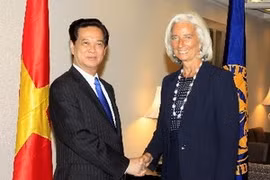Le PM Nguyen Tan Dung reçoit le directeur général du FMI, Mme Christine Lagarde. Photo : VNA
