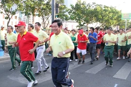 La course à pied de la Journée olympique, dans le 4e arrondissement de Hô Chi Minh-Ville. Photo : VNA