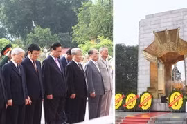 Les dirigeants du Parti et de l'Etat au Mémorial des Héros morts pour la Patrie. (Photo: Trong Duc/VNA)