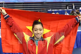 Phan Thi Ha Thanh a décroché l'or au concours général individuel femmes. Photo: VNA