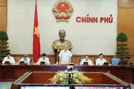 Le vice-Premier ministres Nguyen Thien Nhan préside la conférence. (Source: VNA)