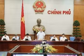 Le vice-Premier ministres Nguyen Thien Nhan préside la conférence. (Source: VNA)