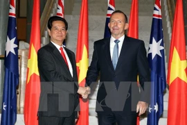 Le Premier ministre Nguyen Tan Dung et son homologue australien Tony Abbott . (Source: VNA)