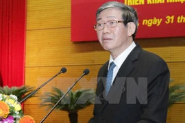 Dinh The Huynh, membre du Bureau politique, secrétaire du CC et chef de la Commission de propagande et de l'éducation du CC du PCV.