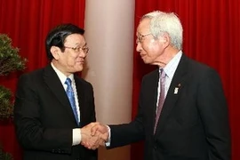 Le président Truong Tan Sang et Tadashi Okamura, président de la Chambre de Commerce et d'Industrie du Japon. (Photo: Nguyen Khang/AVI)