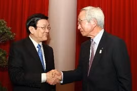 Le président Truong Tan Sang et Tadashi Okamura, président de la Chambre de Commerce et d'Industrie du Japon. (Photo: Nguyen Khang/AVI)