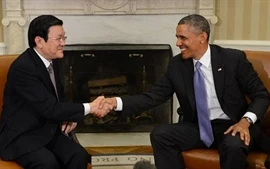 Les présidents vietnamien et américain Truong Tan Sang et Barack Obama (Source : AFP)