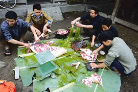 Abattage de porcs la veille du Nouvel An. (Photo:VNA)