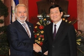 Le président du Vietnam Truong Tan Sang reçoit le ministre nicaraguayen des Affaires étrangères, Samuel Santos Lopez. (Photo: Nguyen Khang/AVI)