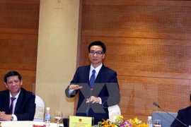 Le vice-Premier ministre Vu Duc Dam prends la parole lors de la réunion. Source: VNA