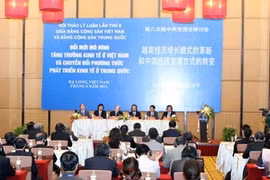 Fin du 8e colloque théorique entre le PCV et le PCC (Photo: Duong Giang/AVI)