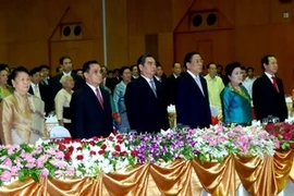Des dirigeants vietmiens et laotiens au meeting (Photo: Hoang Chuong/Vietnam+)