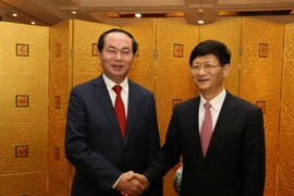Le ministre vietnamien de la Sécurité publique Tran Dai Quang et de son homologue chinois Guo Shengkun. (Source: VNA) 