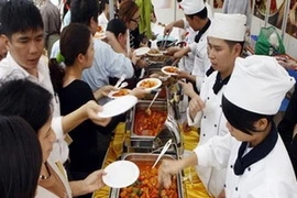 Visiteurs au festival culturel et gastronomique Vietnam-République de Corée 2011. (Source: congan.com.vn)