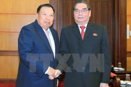 Rencontre de hauts membres des Partis vietnamien et laotien