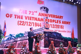 Célébration au Laos des 72 ans de la fondation de l’Armée populaire du Vietnam 